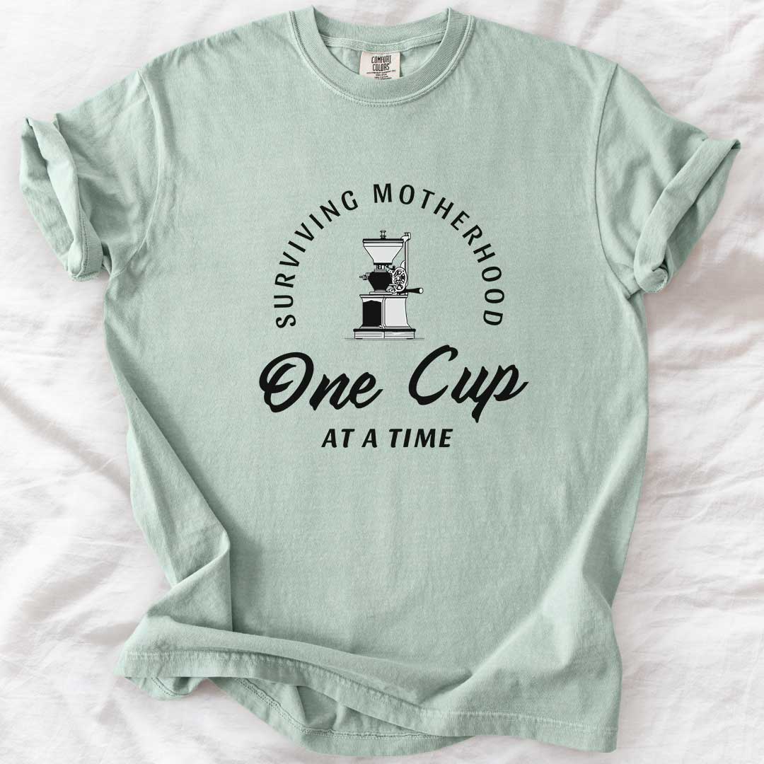 Surviving Motherhood One Cup at a Time T-Shirt