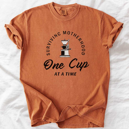 Surviving Motherhood One Cup at a Time T-Shirt